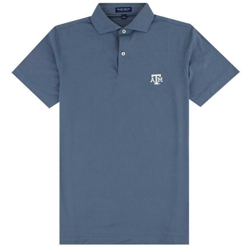 A short-sleeve polo shirt in slate blue with a subtle micro-pattern, featuring a white embroidered 'A&M' logo on the left chest. The shirt is displayed flat against a solid white background.