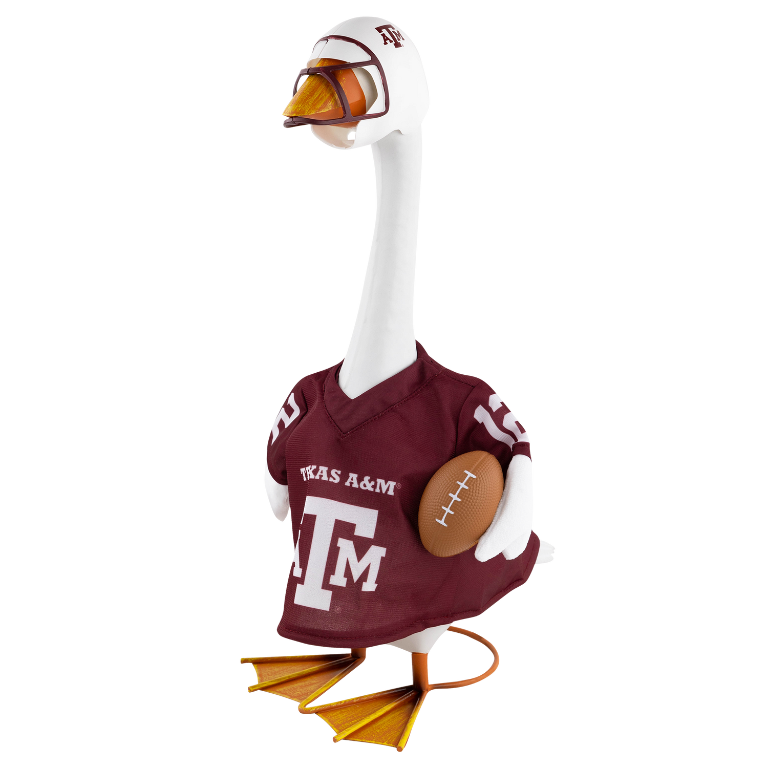 White lawn goose statue wearing a Texas A&M football jersey, miniature helmet with facemask, and holding a small football under its wing.