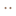 Gold stud earrings in the shape of a star with the Texas A&M logo in the middle