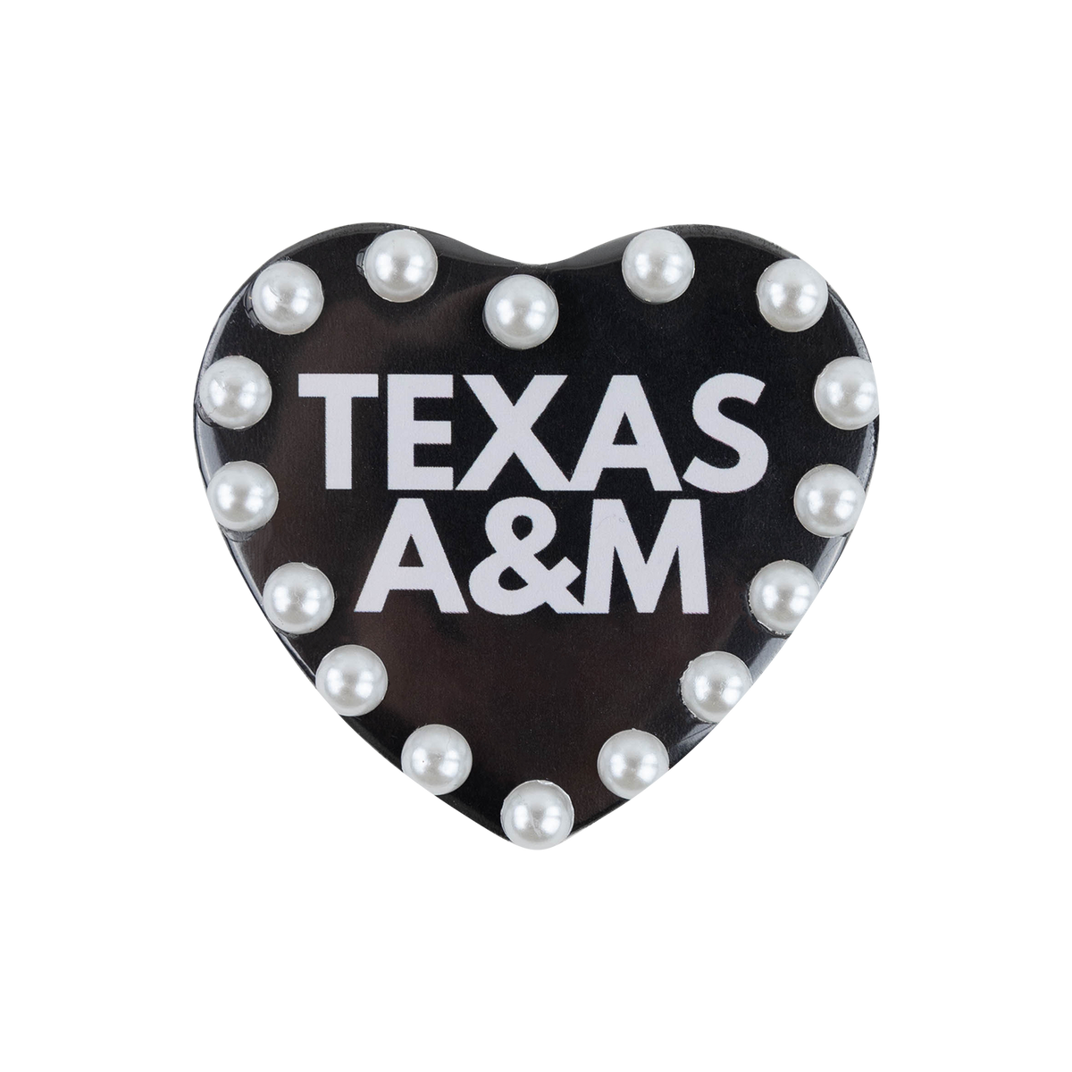 Black heart-shaped Texas A&M pin featuring bold white “TEXAS A&M” lettering and a border of white pearl embellishments.