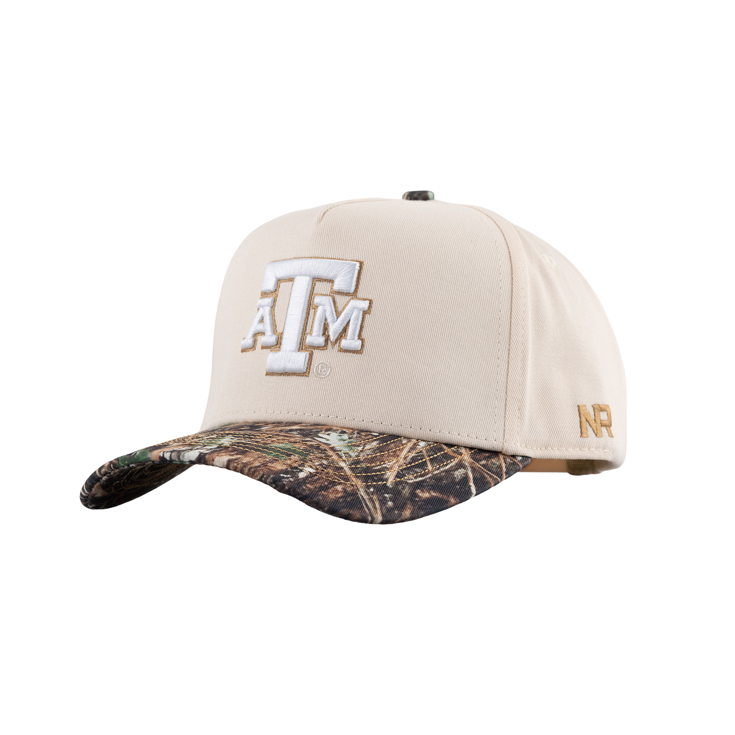 A baseball cap featuring a cream-colored crown with a large white and gold 'A&M' logo on the front, and a camouflage-patterned visor. A small gold 'NR' logo is visible on the side.