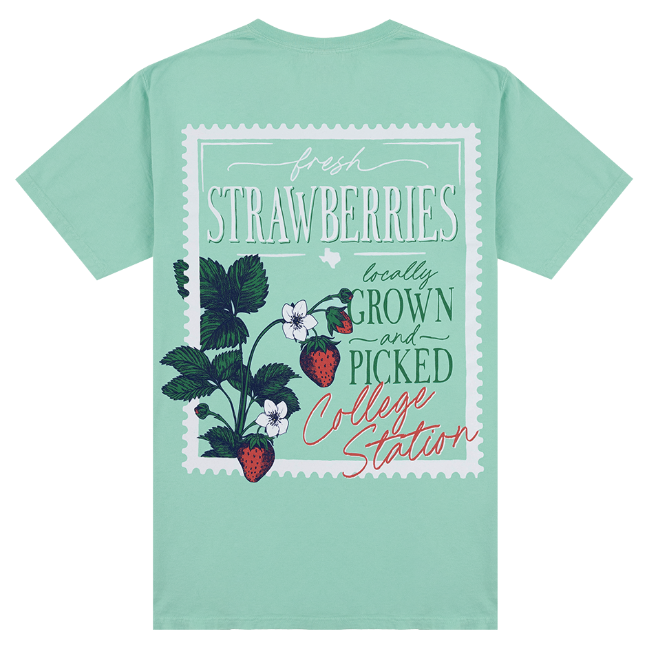 Light green t-shirt with strawberry design and text on a white background