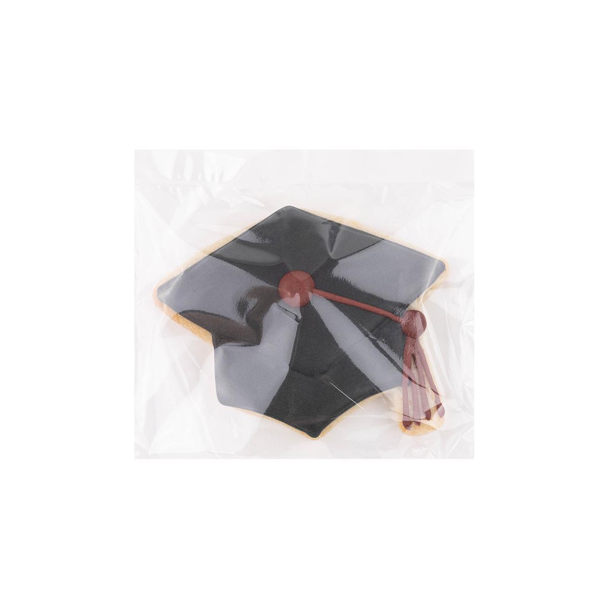 Black icing cap with maroon tassel. 