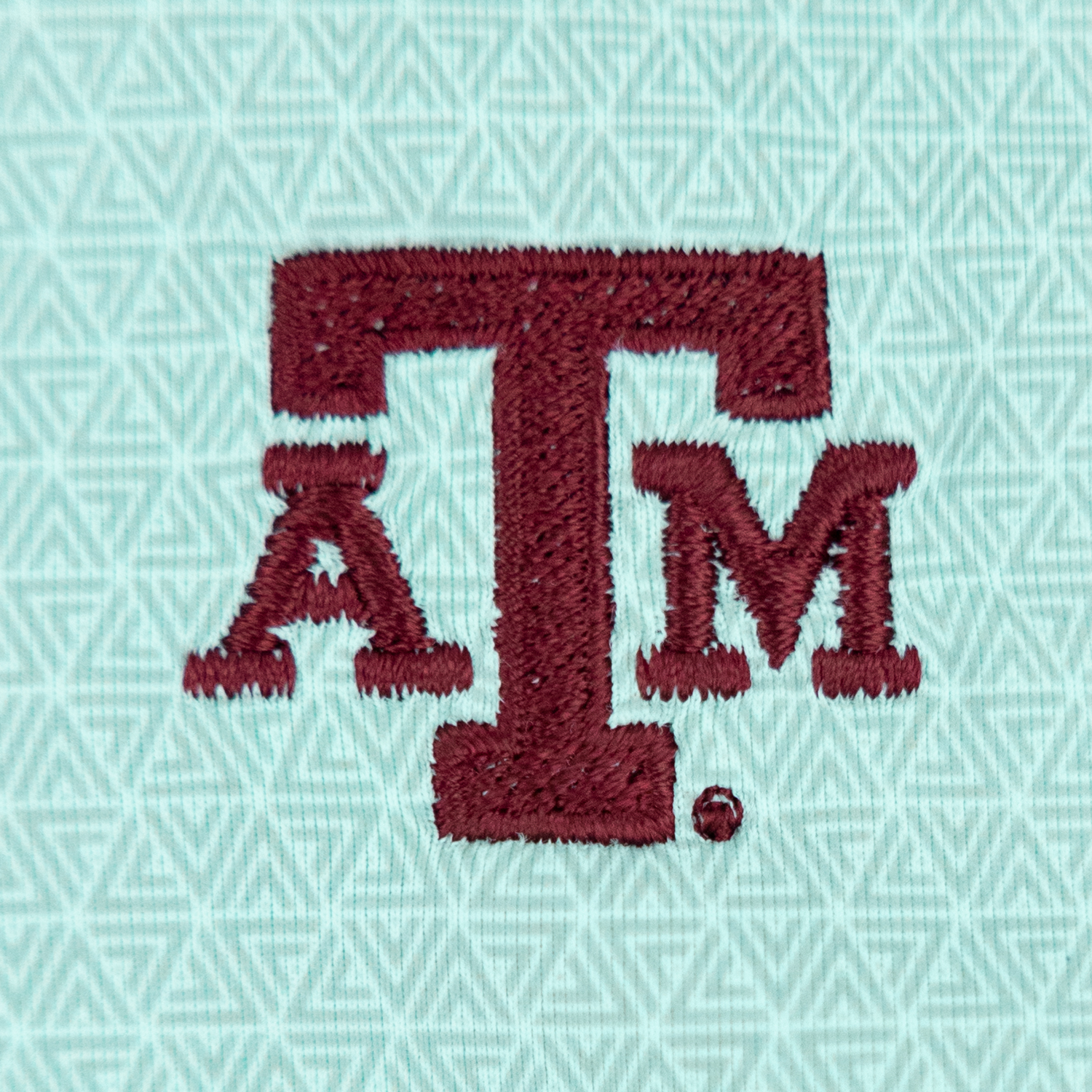 Texas A&M Triangle Printed Aqua Performance Polo